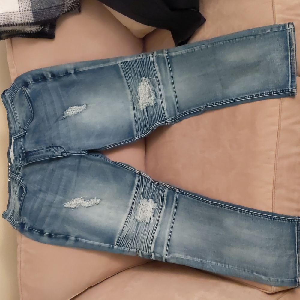 A pair of Raw X Skinny Stretch Jeans size 38-32.